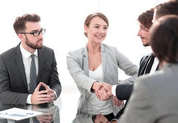 handshake business women with business partner
