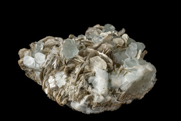 Macro mineral stone Aquamarine in rock on a black background