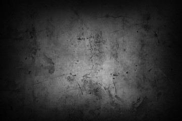 Black rough textured grunge concrete background. Dark edges