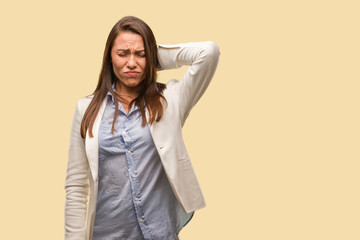 Caucasian business young woman suffering neck pain