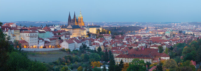 Naklejka na ściany i meble Prague - The panorama of the Town with the Castle and St. Vitus cathedral at dusk.
