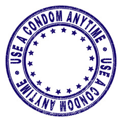 USE A CONDOM ANYTIME stamp seal watermark with distress texture. Designed with round shapes and stars. Blue vector rubber print of USE A CONDOM ANYTIME caption with dust texture.