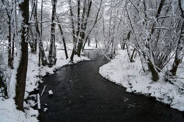 Winter landscape pictures with a lot of snow in cloudy weather in Germany Bavaria included 