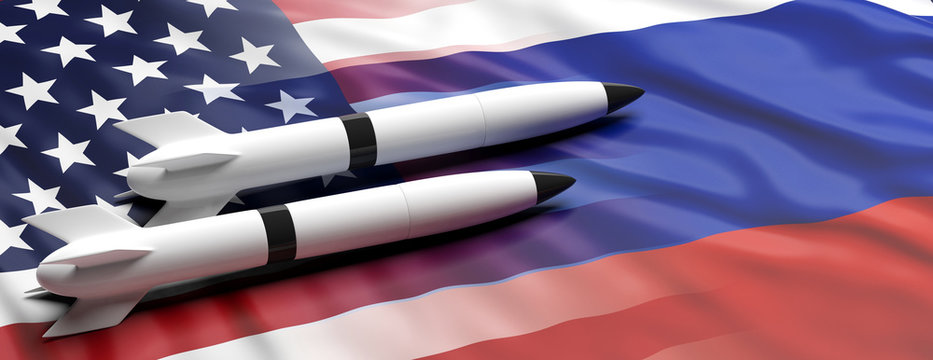 USA and Russia nuclear weapons. Rockets on America and Russian flags background, banner. 3d illustration