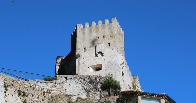 Castle Of Roquebrune-Cap-Martin With Paragliding In The Blue Sky, Old French Medieval Village In France Between Monaco And Menton. French Riviera, Europe - DCi 4K Video