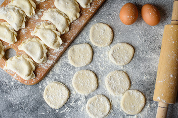 Preparation dough and production of circles from dough for preparation of dumplings with a stuffing. It can be used as a background