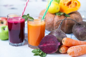 fresh juice from homemade vegetables. Beet and carrot smoothie. Detox, vegetarianism On a bright...