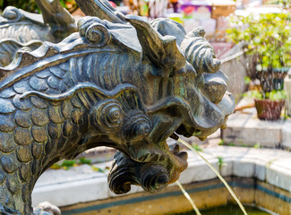 Dragon statue fountain water