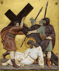 Naklejka premium Simon of Cyrene carries the cross, 5th Stations of the Cross in Hohenberg, Germany