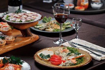 A glass of red wine on the table before dinner