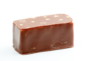 Chocolate covered marshmallow with stars on the top.