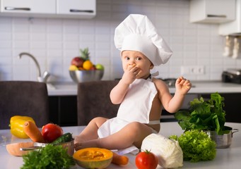  little boy, white chef hat, vegetables