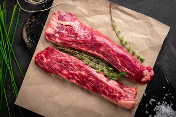 raw bavet beef tenderloin steak, alternative cuts for grill, top view