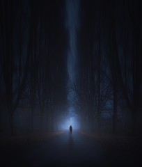 Surreal horror scene with alone strange man in dark night forest - 247464234