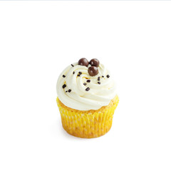Cupcake with delicate cream and candy on a white background. The concept of food, desserts, holiday