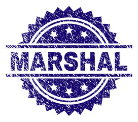 MARSHAL stamp seal watermark with distress style. Blue vector rubber print of MARSHAL title with scratched texture.
