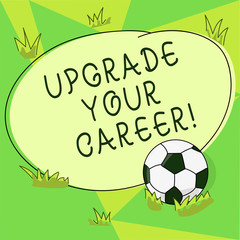 Conceptual hand writing showing Upgrade Your Career. Business photo showcasing improve grade position in work Get increase Money Soccer Ball on the Grass and Blank Round Color Shape photo