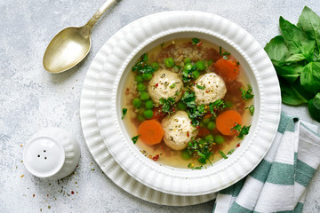 Buckwheat soup with vegetables and chicken meatballs.Top view with copy space.