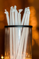 wrapped drinking straws in glass container