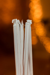 restaurant straws with a beautiful bokeh background