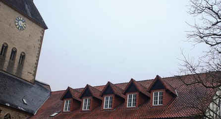 roof,church,clock,building, roof, sky, home, window, blue, residential, red, exterior, brick, windows, facade, houses, white, construction, old, estate, wall, new, 