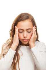 Young girl suffering from headache desperate and stressed because of pain and migraine with hands on head isolated on white background