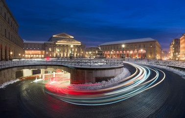 Fototapeta premium Light trails in front of Munich National theatre and Maximilian street at night