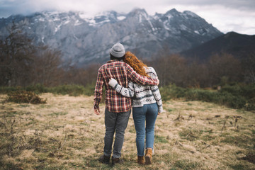 couple walking in the mountains