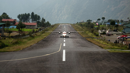 The plane landing at Lukla airport - one of the most dangerous airport in the world