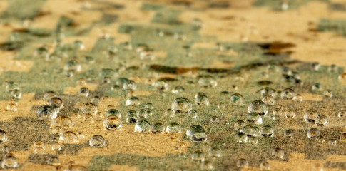 Naklejka premium Water droplets on moisture resistant fabric Close up