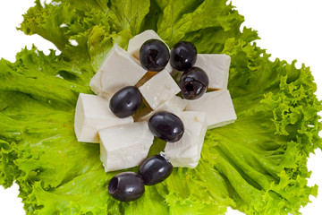 Lettuce and feta on the white background