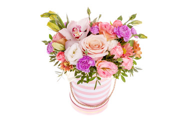 Bright buketny composition from fresh flowers, the white isolated background