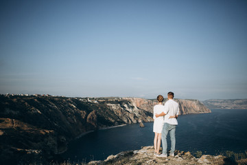 Beautiful couple on sunset photoshoot