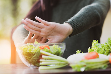 Asia woman eating ,vegetables and fruits, useful food  with happiness.