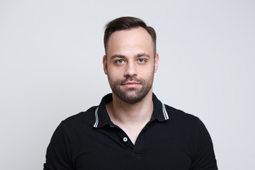 Obraz premium Portrait of handsome man over white background.
