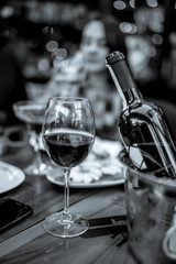 red wine with ice bucket black and white