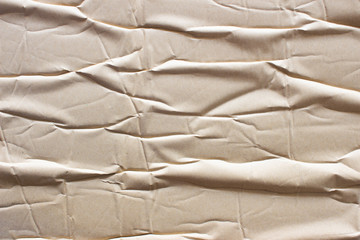 Texture crease of brown paper for template wallpaper. wrinkle of brown paper crumpled background.