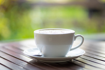 Fototapeta na wymiar Hot coffee mug placed on the table
