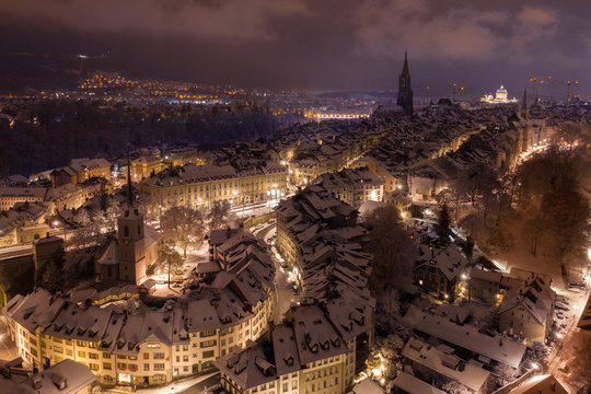 Aerial view of the Old Town of Bern covered in Snow at Night