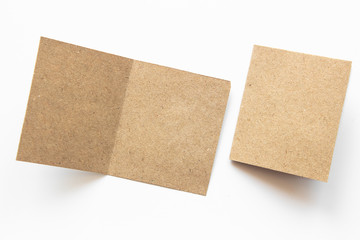 Brown blank portrait. brochure magazine isolated on gray, changeable background / brown paper isolated on gray