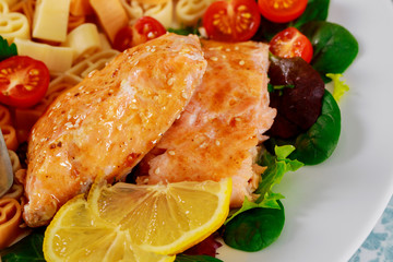 Pasta in the form of a heart and salmon