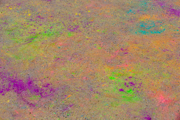 Background of colorful Holi powder on the ground