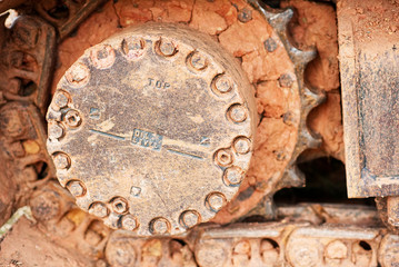 Fototapeta na wymiar A closeup of the drive gear on a large track hoe.