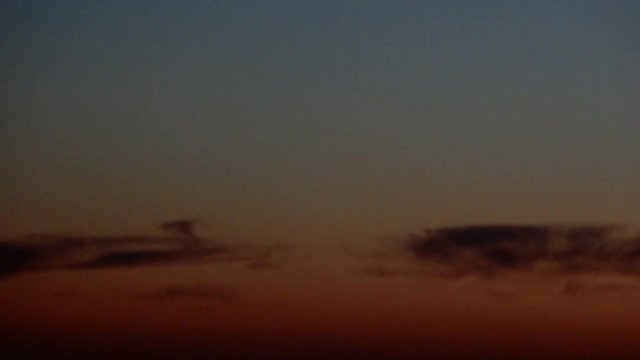 Sunset Orange With Clouds Fading To Black Timelapse
