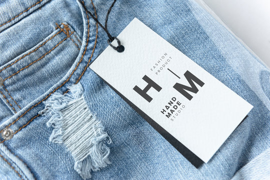 Ripped jean shorts with a tag mockup foto de Stock | Adobe Stock
