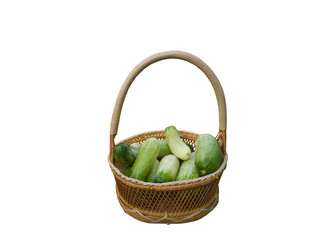 Fresh Cucumber in the basket isolated on white background with clipping path.