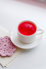 Morning scented tea cup in morning light on white background, minimal concept of hrelthy breakfast