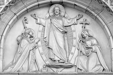 Fototapeta na wymiar PRAGUE, CZECH REPUBLIC - OCTOBER 17, 2018: The relief of Jesus and st. Cyril and Metodius on the portal of the church kostel Svatého Cyrila Metodeje by Václav Levý (1867 - 1869).