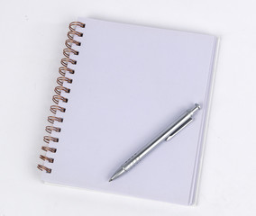 Empty notebook with pen