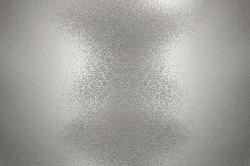 Reflection on rough silver wall surfaces, abstract background